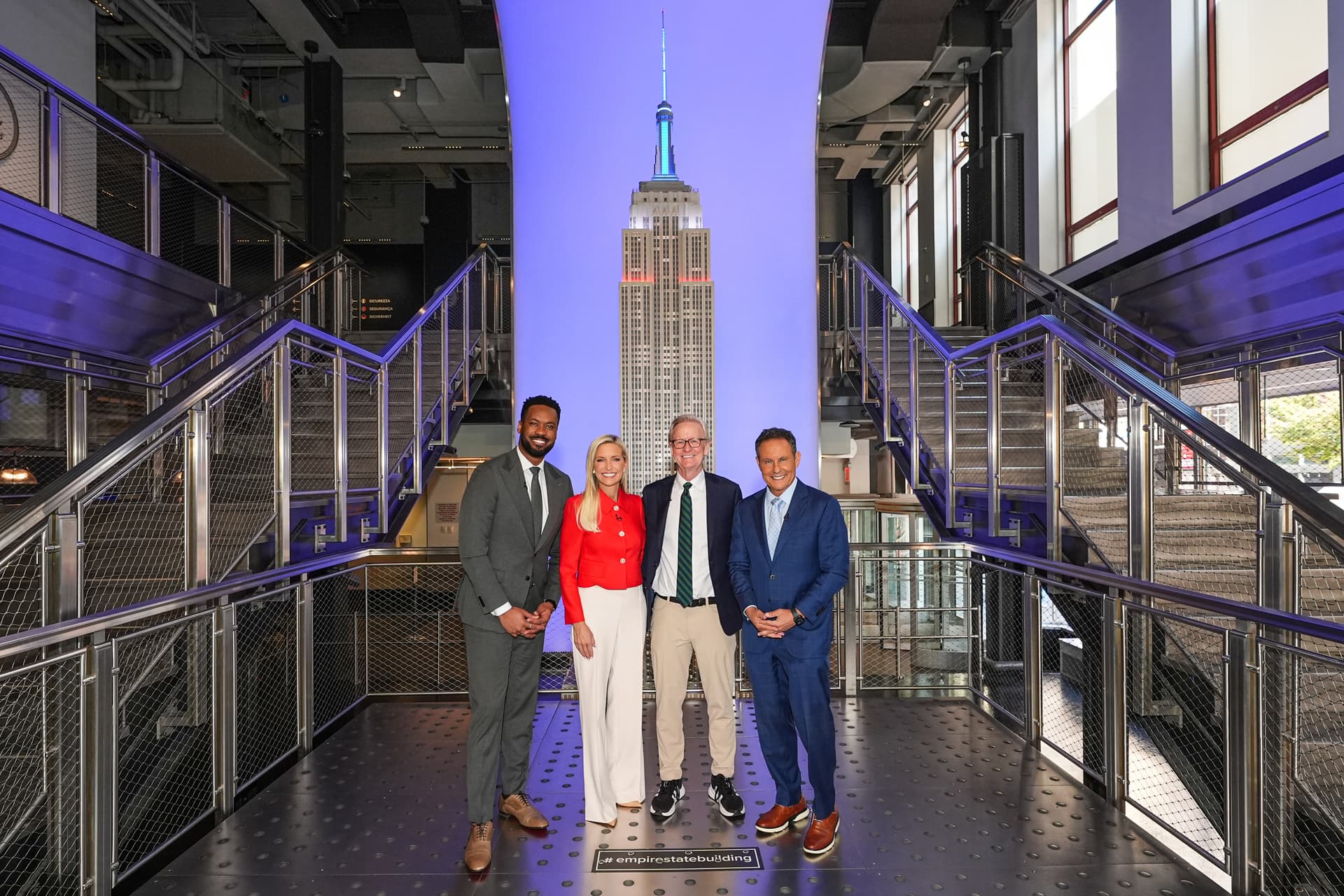 Steve Doocy, Ainsley Earhardt, Brian Kilmeade and Lawrence Jones at the Grand Staircase